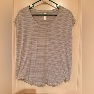 Athleta gray and white striped short sleeve top in a size M EUC